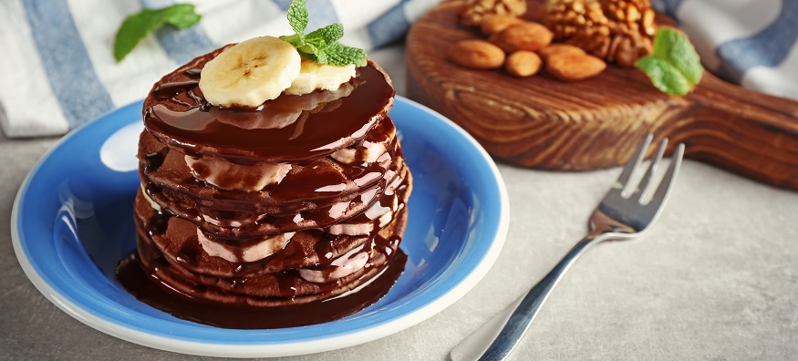 a stack of chocolate and banana pancakes
