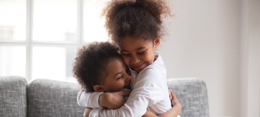 a woman hugging her daughter