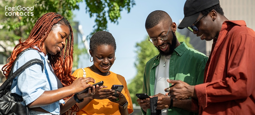 Students looking at their mobile screens