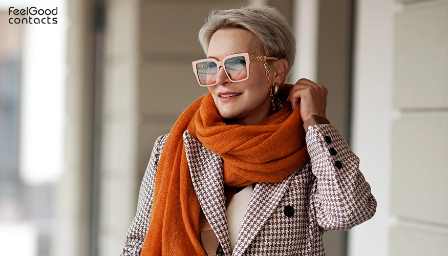 Woman wearing scarves and glasses.