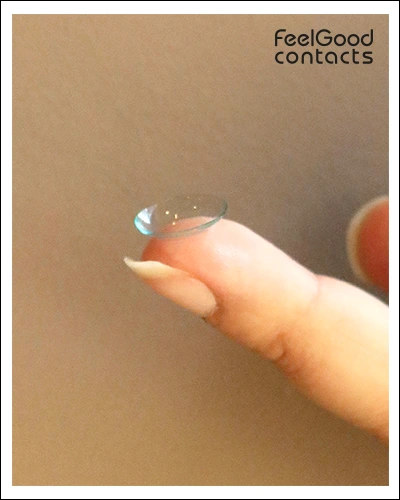 Place the contact lens on the fingertip.