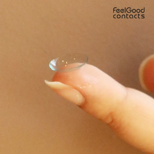 Place the contact lens on the fingertip.
