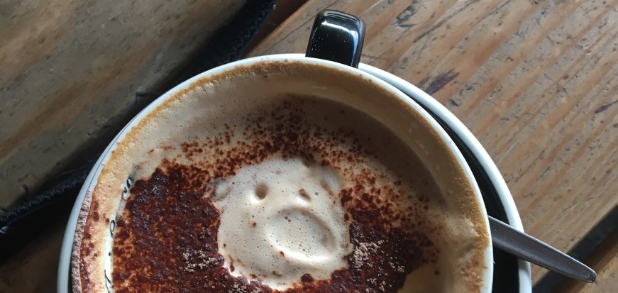 Funny face in a cup of coffee
